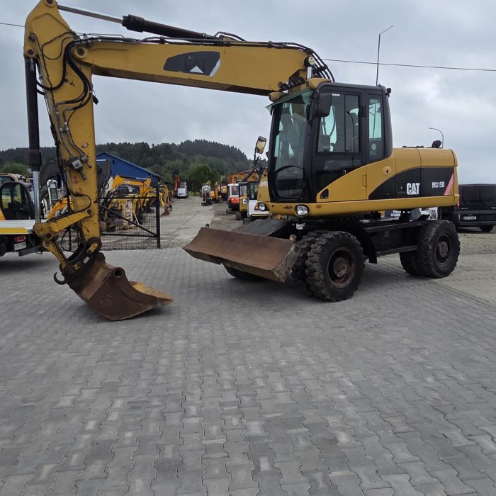 Koparka kołowa Cat 315 D