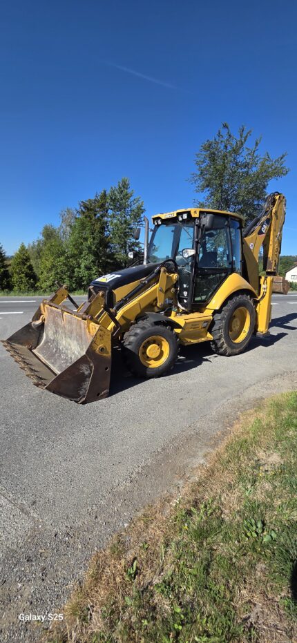 Koparko-ładowarka Cat 428 E